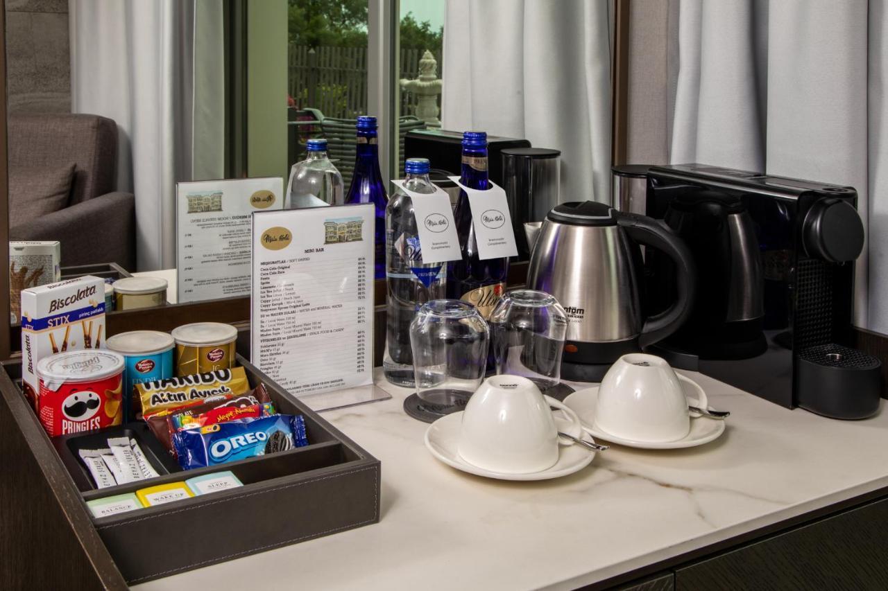Mula Hotel イスタンブール エクステリア 写真 A hospitality tray in a hotel room